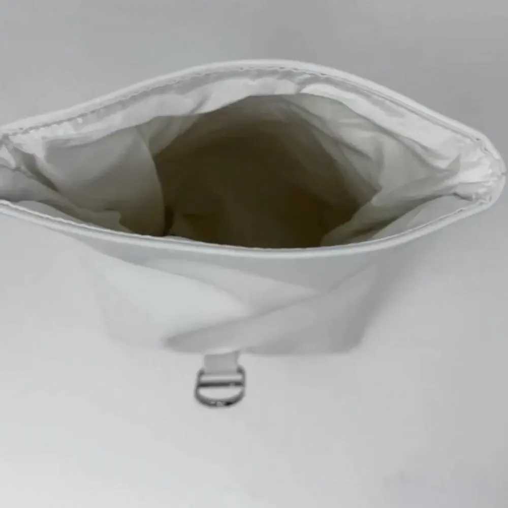 Dior white roll top cosmetic pouch